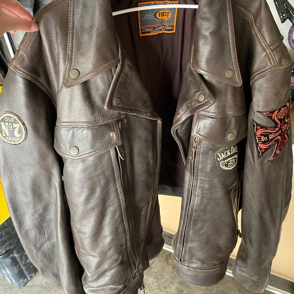 vintage leather jacket. jack daniel, harley davidson, house of blues etc.